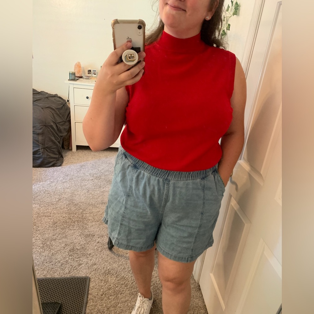 Red sleeveless mock neck top